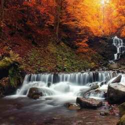 Jigsaw puzzle: Small waterfall in the mountains