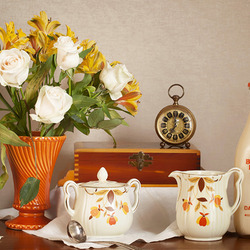 Jigsaw puzzle: Still life with tea set and milk