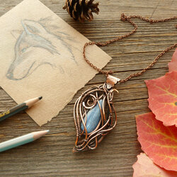 Jigsaw puzzle: She-Wolf Copper Pendant