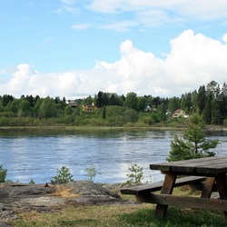 Jigsaw puzzle: Bench by the river
