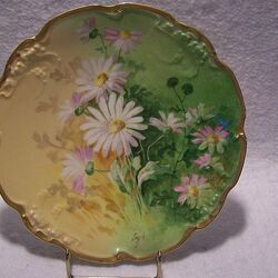 Jigsaw puzzle: Plate with painting. Limoges porcelain